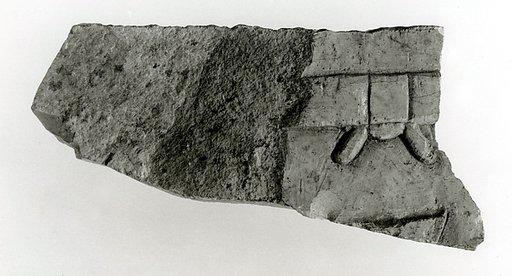 Raised relief fragment with hieroglyphs
