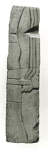 Raised relief fragment with three men holding a rope