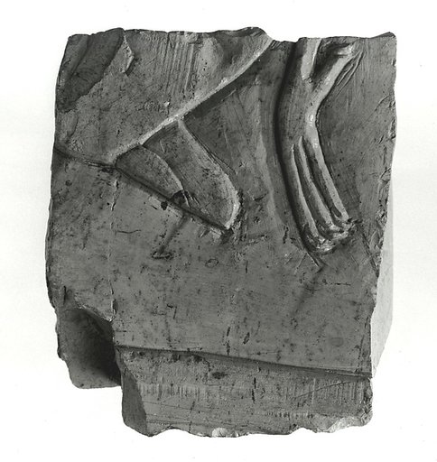 Raised relief fragment with a hieroglyph