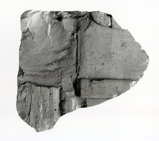Raised relief fragment with part of an inscription