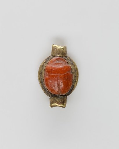 Scarab set in a ring bezel