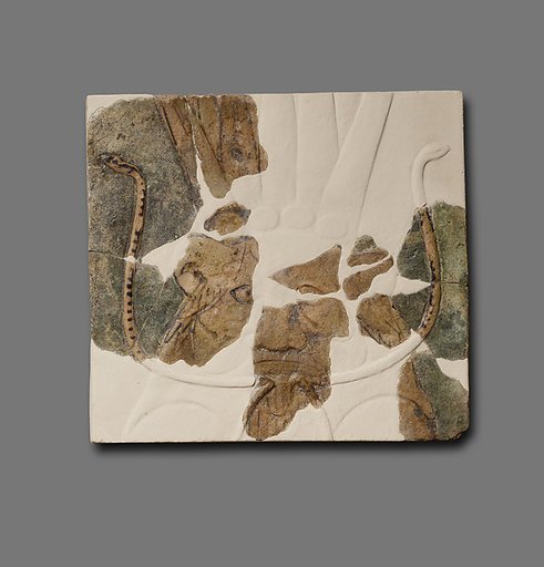 Tile with the image of Bes from the palace of Ramesses II