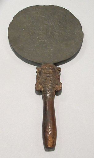 Mirror with a Lotus Handle Decorated with the Head of Bes