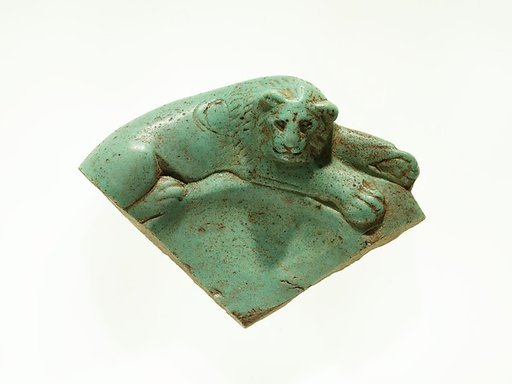 Fragment of a dish with a lion reclining on the rim