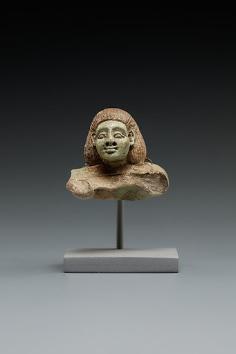 Head and Torso from a Male Swimmer Holding a Spoon