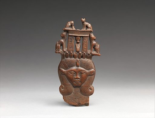 Head of Hathor from a clapper the inscription calling the musician who used it "beloved by  the goddess Mut , Lady of Isheru  (Karnak)