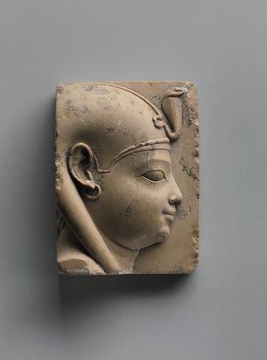 Plaque with bust of a divine child with earring (Ihy?)