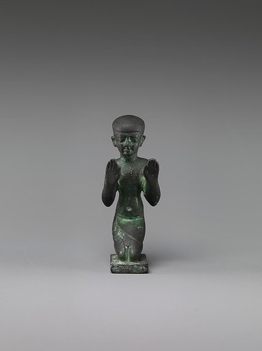 Statuette of an adorant from a group with a god
