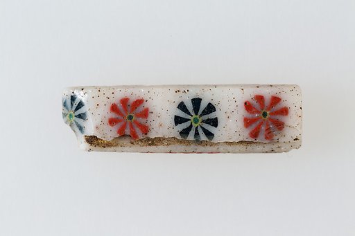 inlay with row of rosettes
