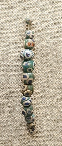 String of 12 Eyed Beads