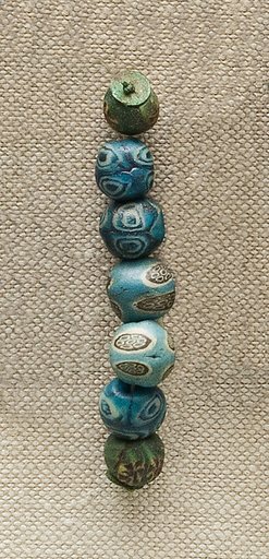 String of 7 Eyed Beads