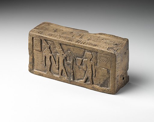 Part of a bronze statue base inscribed in Egyptian and Greek