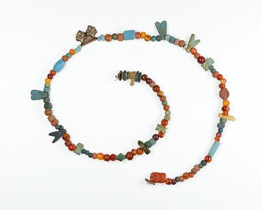 Necklace with fly amulets