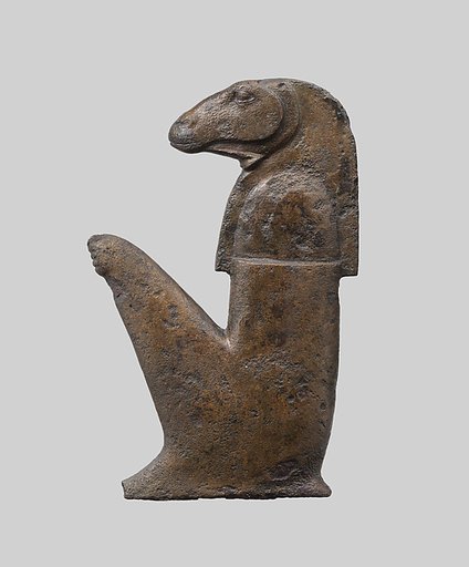 Furniture attachment with a sitting ram-headed deity