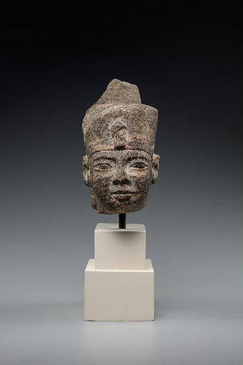 Head of a king in the red crown