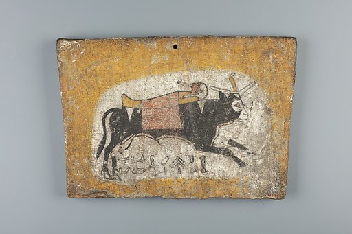 Coffin Footboard depicting Apis bull carrying mummy