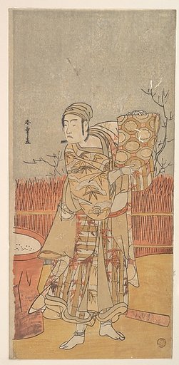 The Actor Sawamura Sojuro III Holding up a Piece of Brocade