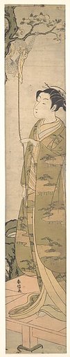 A Woman Playing with a Monkey which Has Climbed a Tree