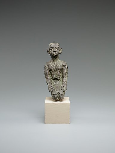 Kneeling priest