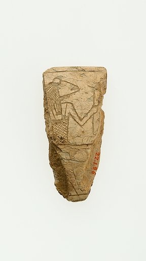A fragment of a magic wand illustrating a frog headed deity