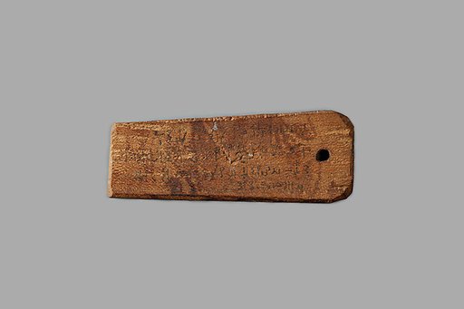 Mummy label of Senpnouthe, daughter of Sulis; her mother Taphiomis