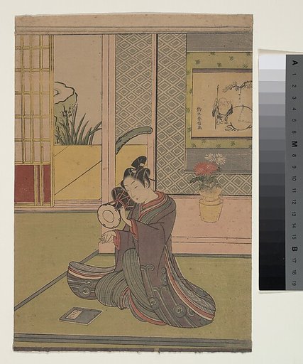 Young Man Playing a Noh Drum