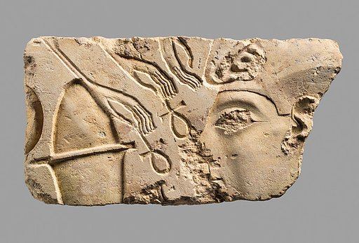 Relief showing the Aten interacting with the queen