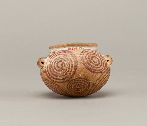 Squat decorated ware jar depicting spirals