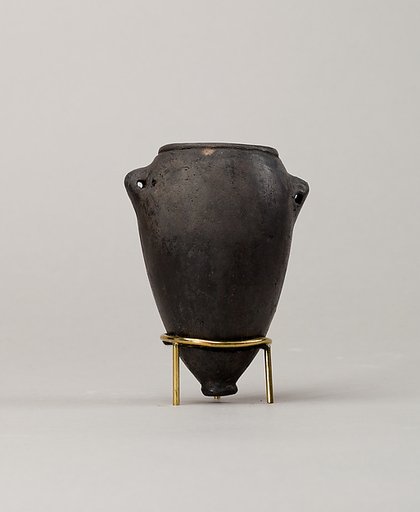 Black polish ware jar with lugs