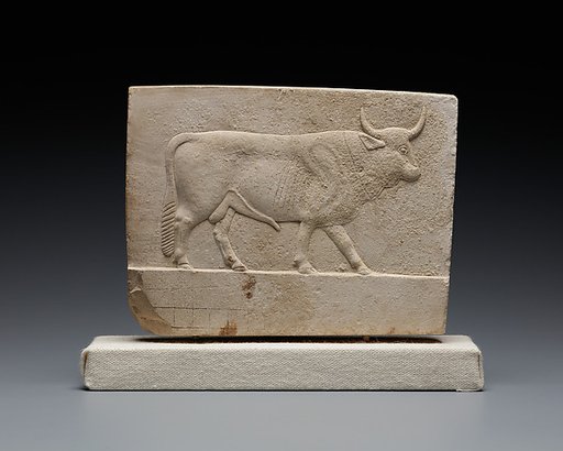 Relief plaque with a bull on one side and a ram on the other