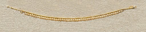 String of elongated disk beads