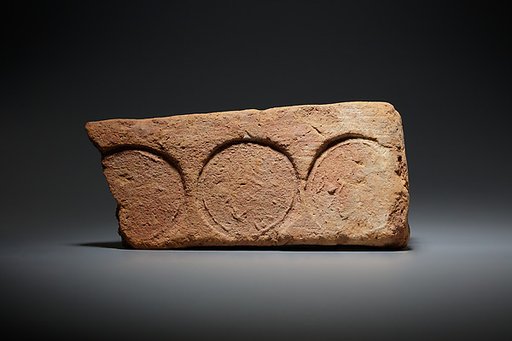 Brick Stamped with a Circular Seal