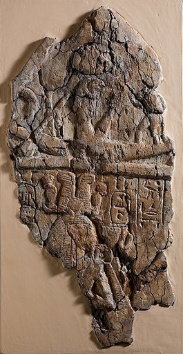 Fragment of Stela depicting a figure labeled 'excellent spirit of Re'  facing Ramesses I and  Ahmose-Nefertari beneath the barque of Re