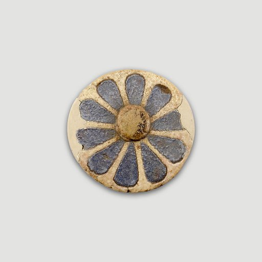 Glazed disk in the shape of rosette