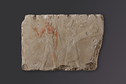 Relief fragment depicting two figures winnowing