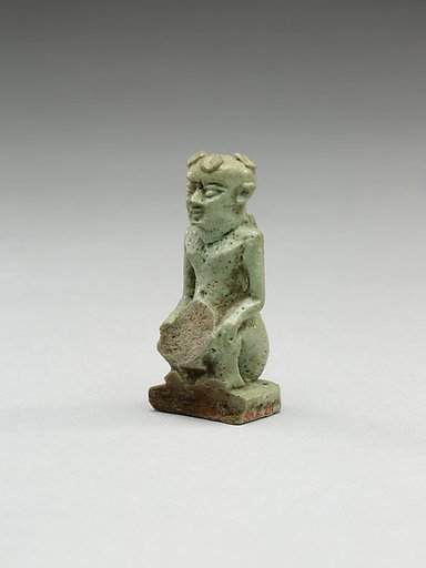 Nude crouching figure wearing a wreath, large phallus broken away