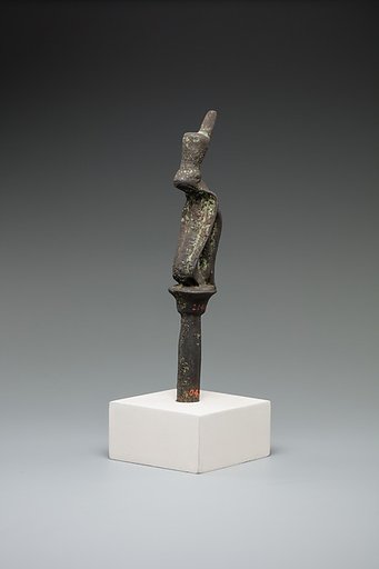 Cobra wearing red crown on a papyrus stem