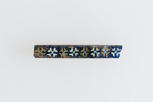 Inlay with row of rosettes