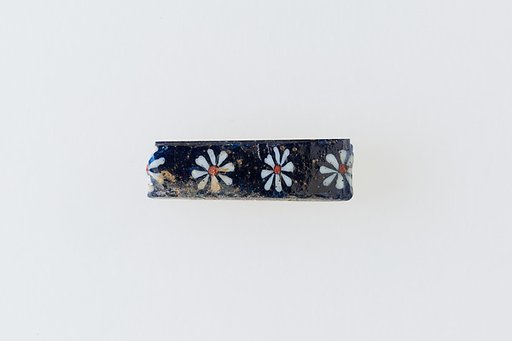 Inlay fragment with row of rosettes