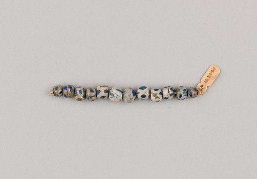 String of 12 Eyed Beads