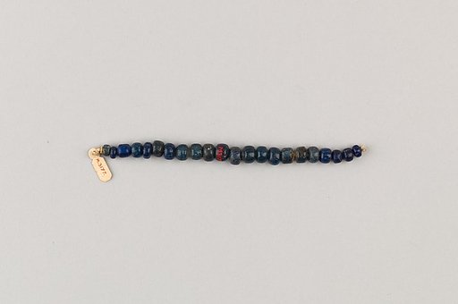 String of 22 elongated disc beads