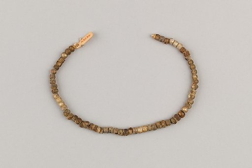 String of 61 spheroid beads
