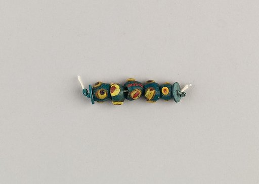 String of 5 eyed beads