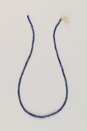 String of tiny disc beads