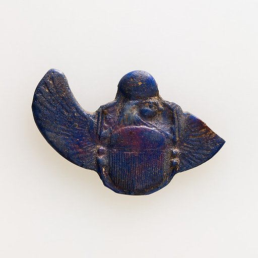 Amulet of winged scarab with falcon head