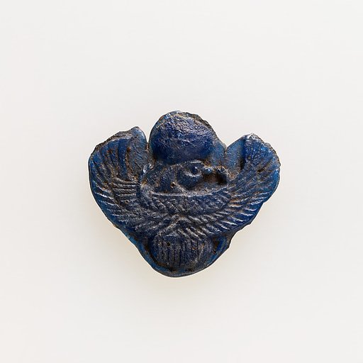 Amulet of winged scarab with falcon head