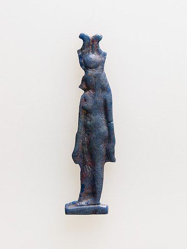Amulet of cow-headed goddess with feathers atop disk and horns