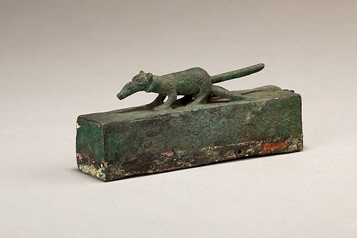 Shrew surmounting a box for animal mummy