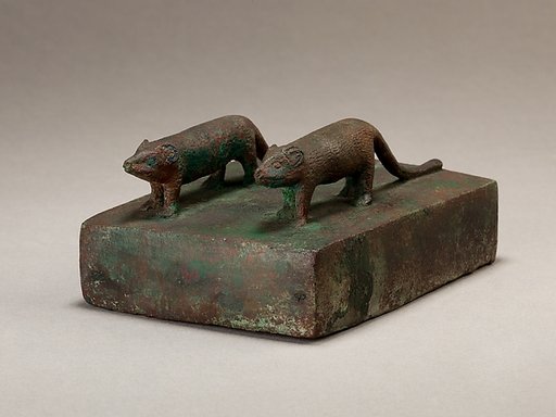 Two ichneumons surmounting a shrine-shaped box for an animal mummy