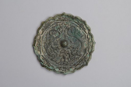 Mirror decorated with dragons, ritual bronze, and clouds